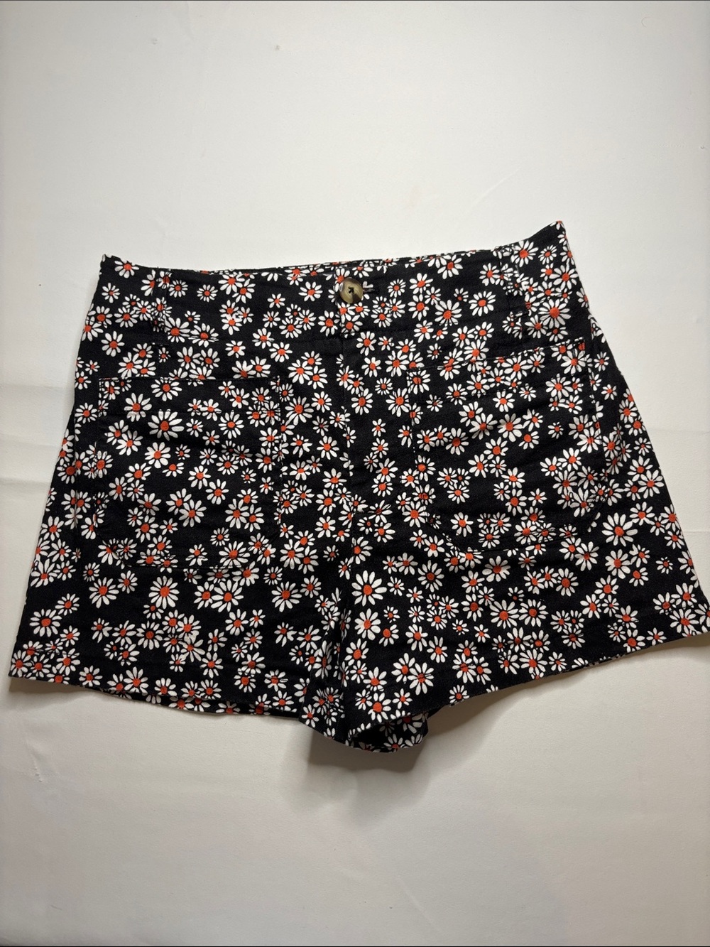 Anthropologie Black Daisy-Print High-Rise Shorts with White & Orange Flowers